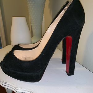 Red Bottoms by Louboutin